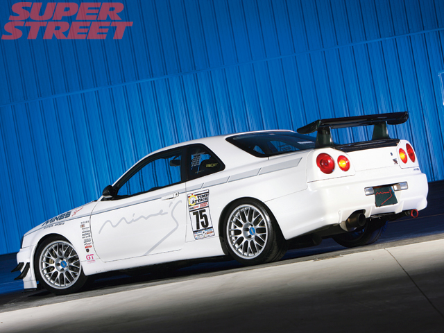 130_0703_17_z+r34_nissan_skyline_gtr+left_side_rear_view.jpg